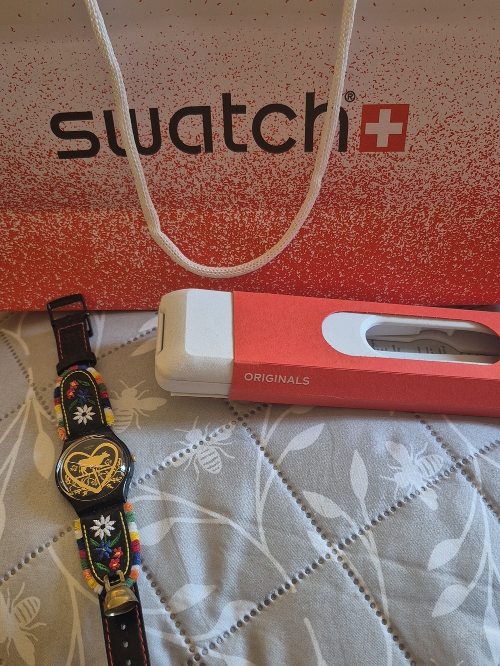 Swatch Black Watch with Multicolor Floral Embroidered Strap